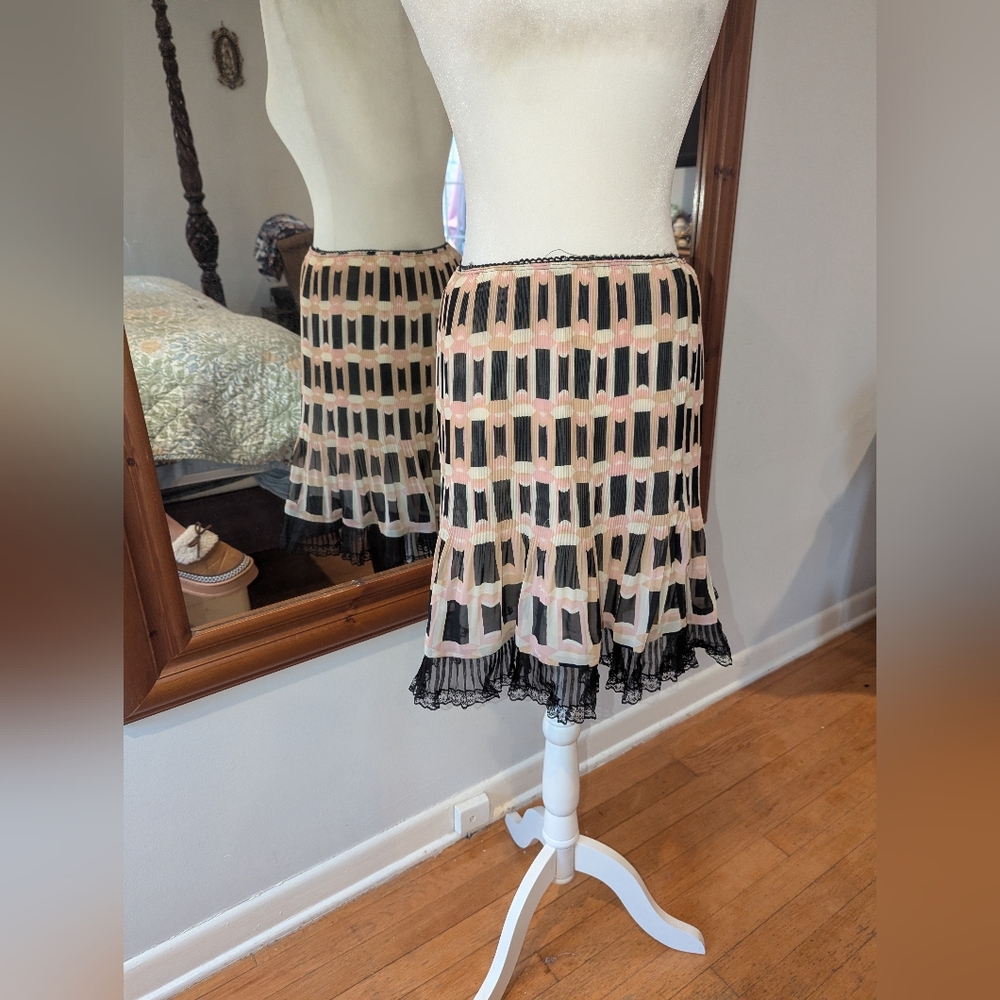 Geometric Pleated Midi Skirt in Black and Blush